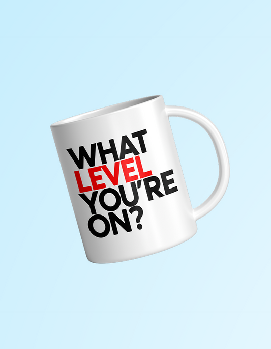 White mug with text 'WHAT LEVEL YOU'RE ON?' on a light blue background